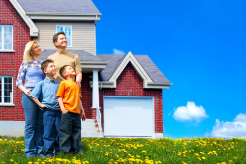 Young family dreaming about a new home. Real estate concept